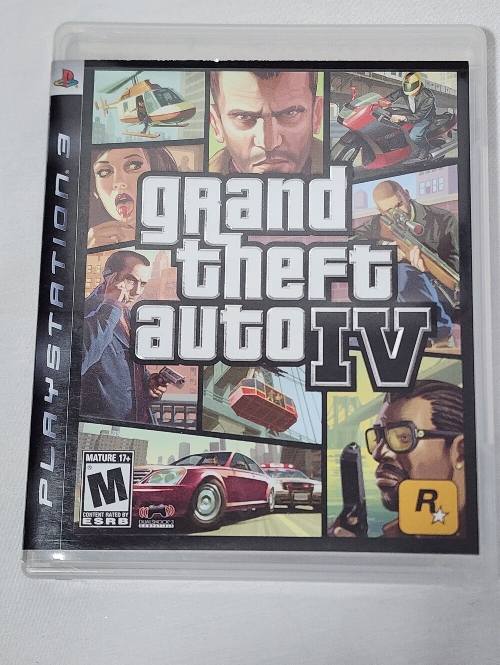Grand Theft Auto IV (PlayStation 3 Console) With Guide Book